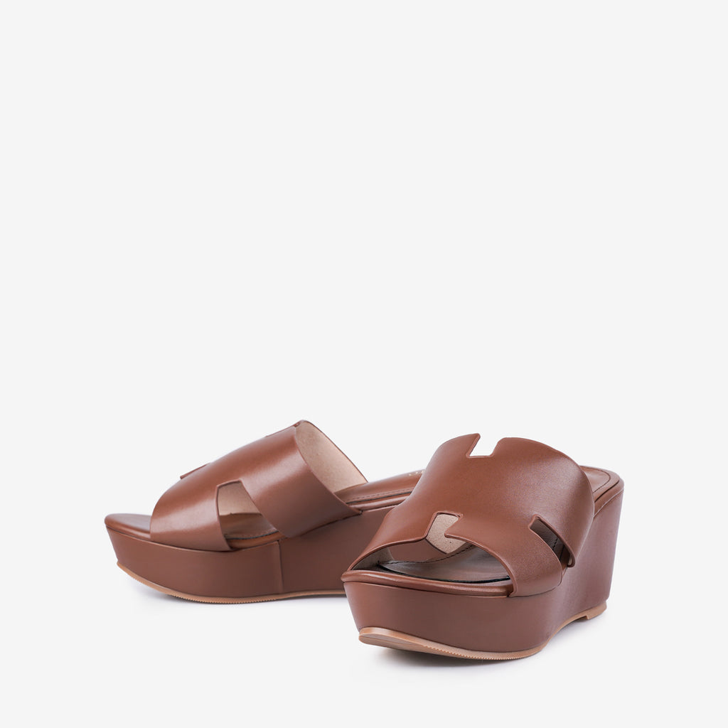 Lewré Nova brown wedge sandals with wide straps and slip-on style